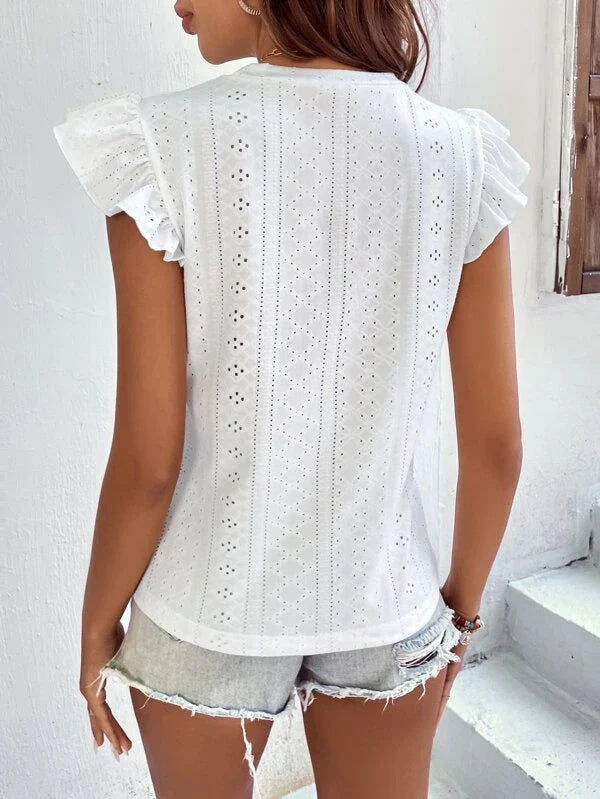 Janne | Eyelet blouse with a frill